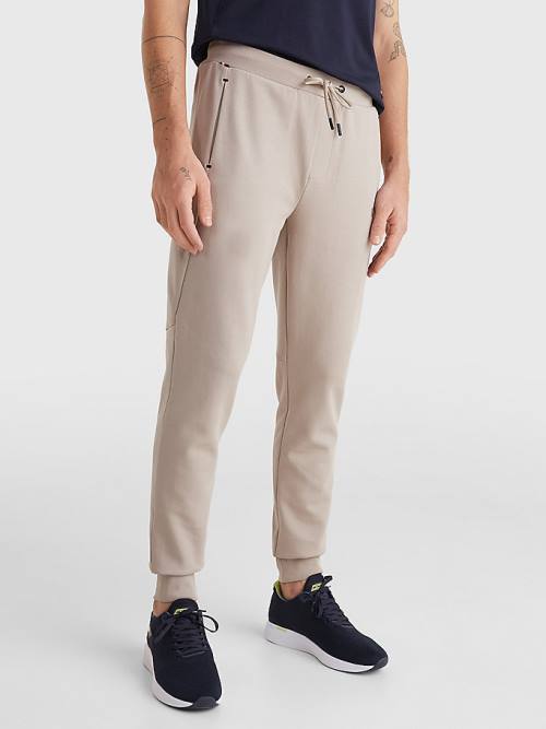 Tommy Hilfiger Tech Essentials Joggers Moški Hlače Bež | TH045UIV